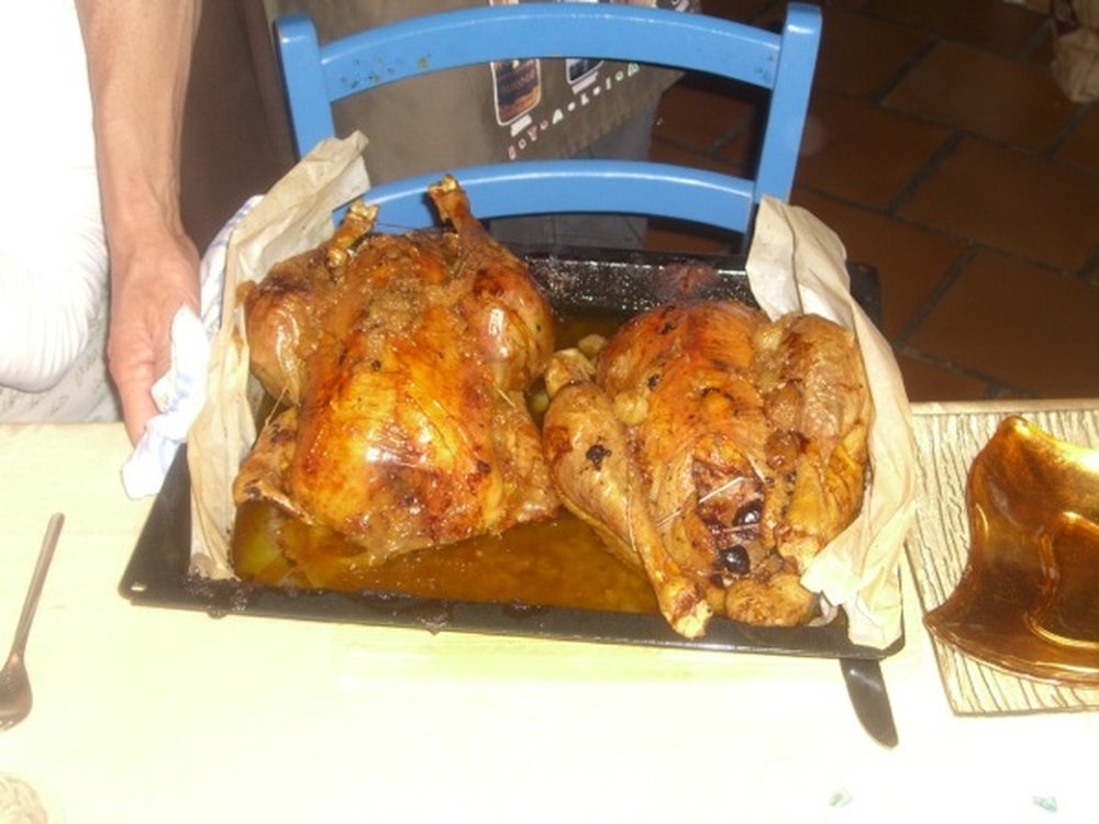 Capón asado al espetón
