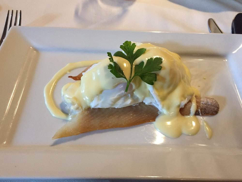 Eglefino ahumado con huevos escalfados y crema