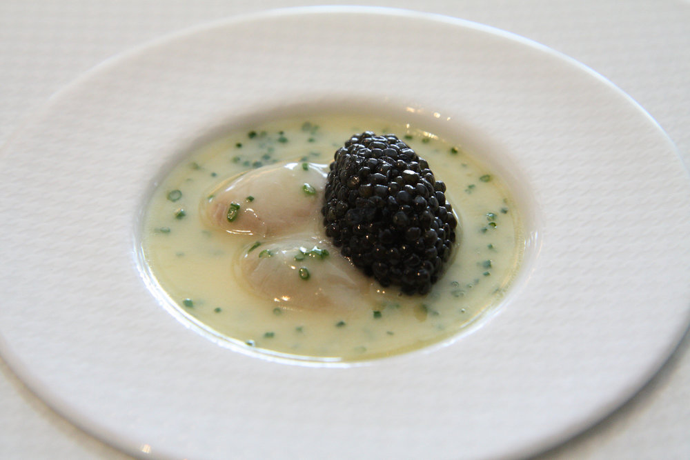 Baked oysters with caviar