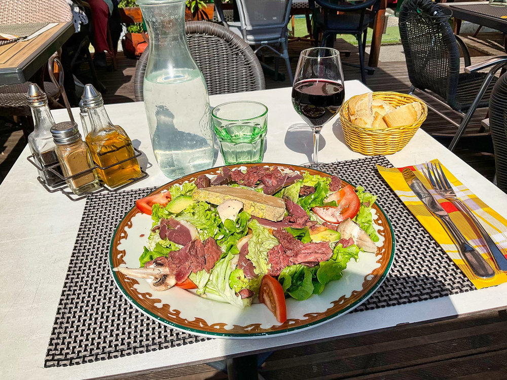 Duck gizzard salad with raspberry vinegar